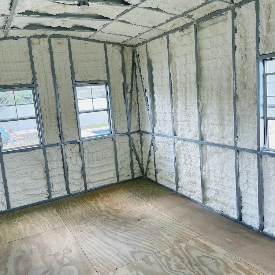Closed-cell spray foam insulation applied to wall cavities in a residential project in Flower Mound
